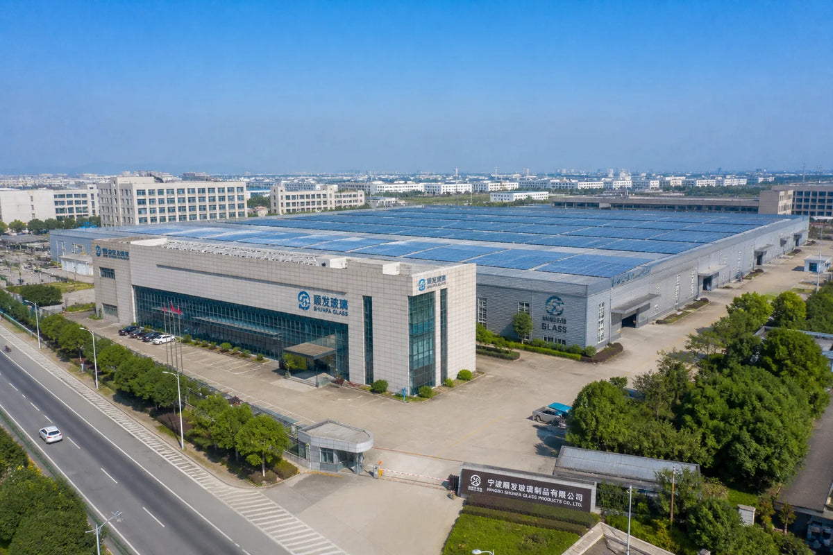 Aerial exterior view of Fenghua Boyu Glass manufacturing facility in Ningbo industrial zone