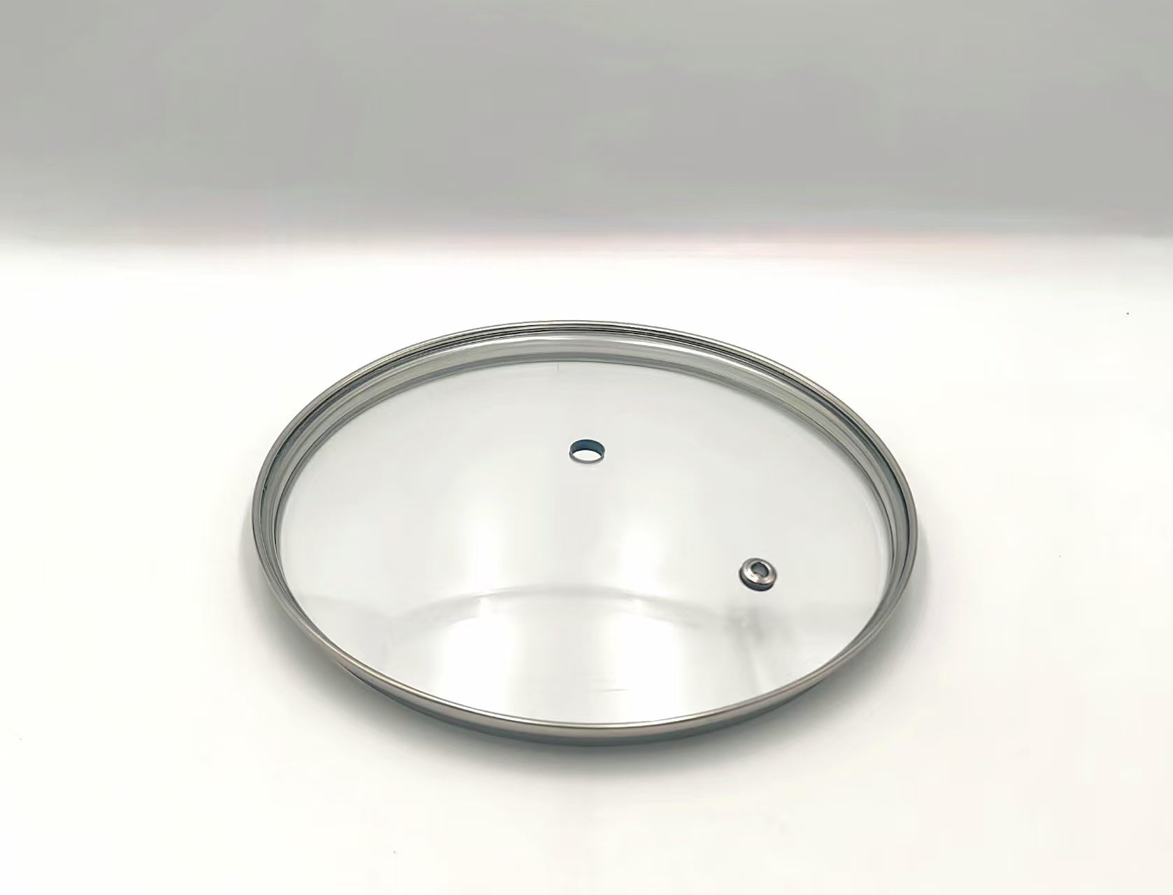 G18 - G-Series Narrow Rim Glass Lid (177–187mm) — angled detail view of stainless rim and glass dome