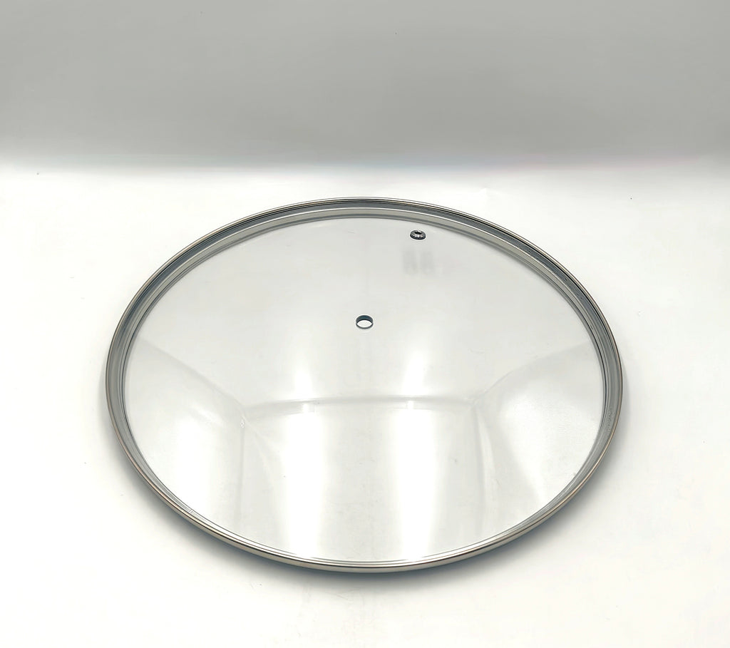 G28 - G-Series Narrow Rim Glass Lid (277–287mm) — angled detail view of stainless rim and glass dome